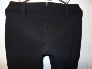 Stoffhose mit leichtem Peeling am Hintern<br /><br />Entsorgt