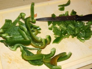Second, peppers are cut. Throw remains to the bin.