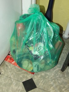 Put the bag near the door. Don't forget to throw out it tomorow.